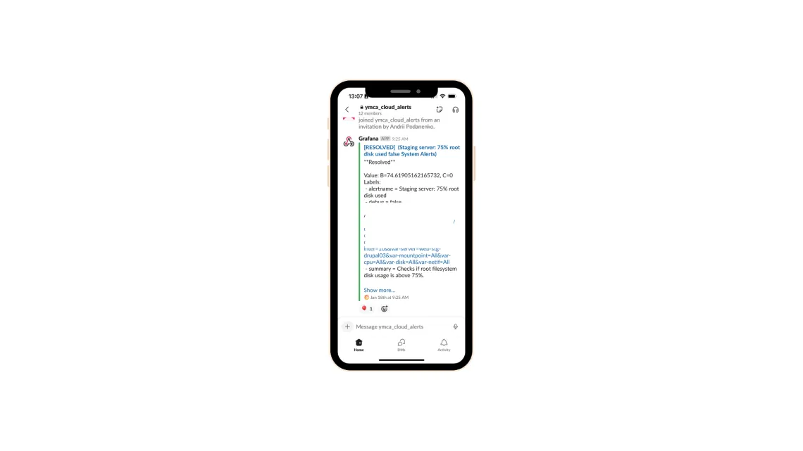 Smartphone displays alerts, showing a resolved issue, specifically about a staging server reaching 75% root disk usage.